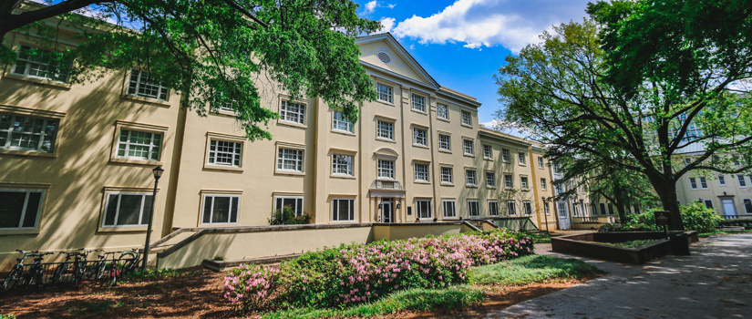 Wade Hampton at Women's Quad with blooming bushes and trees