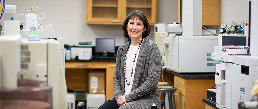 Nicole Berge sits in her lab.