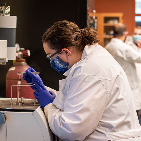 Bessman working in lab