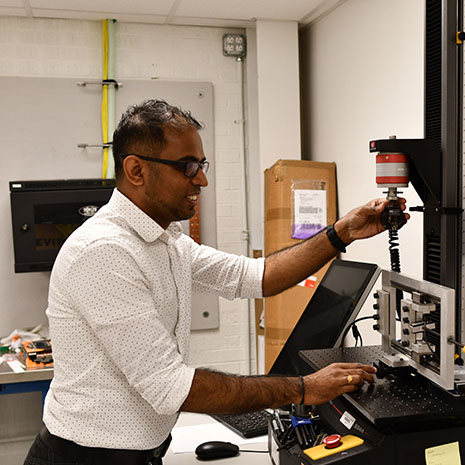 Sockalingam working in a lab