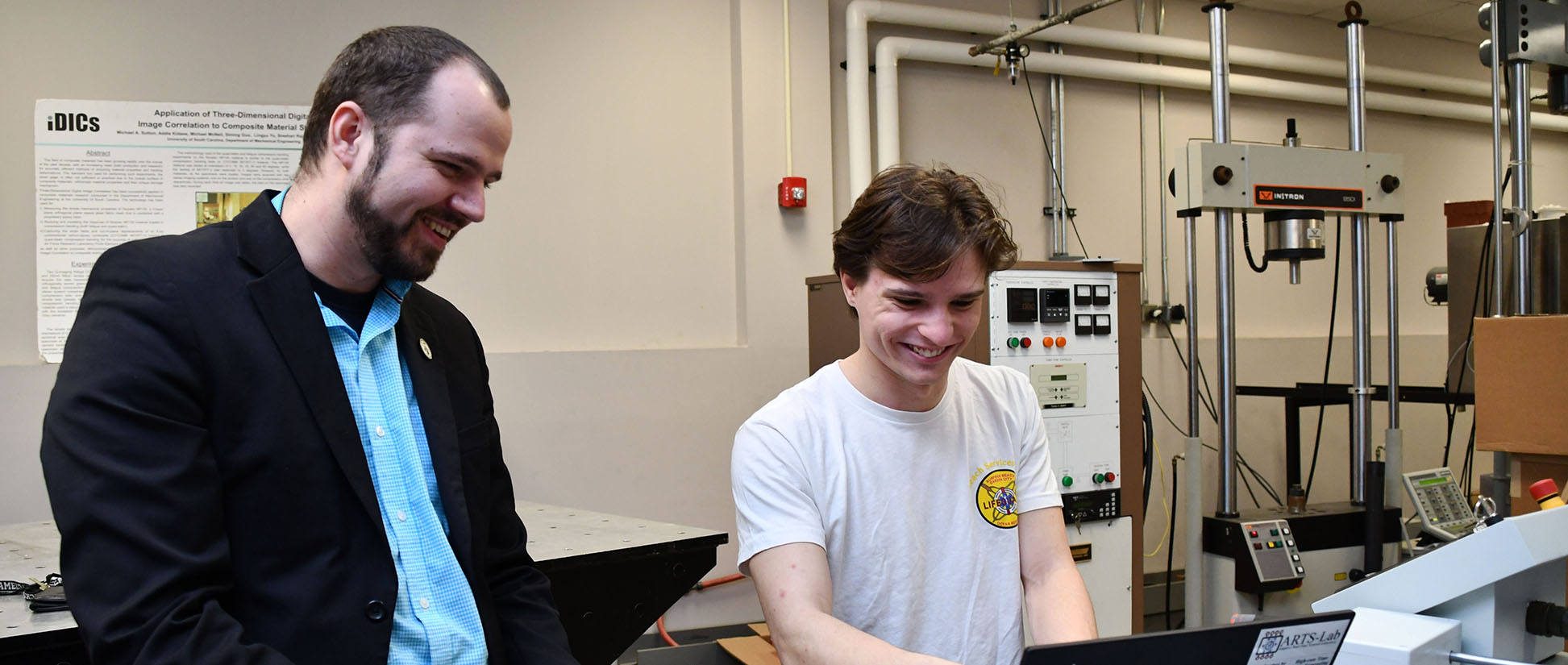 Austin Downey and student in a lab