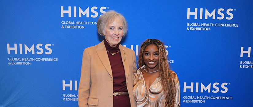 Elizabeth Regan and Olympic gymnast Simone Biles