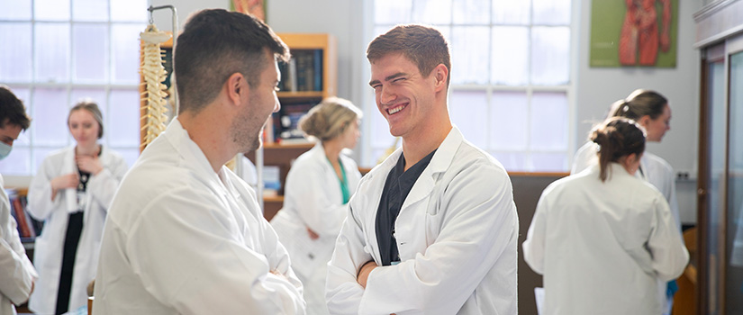 Pair of students chatting in Anatomy Lab